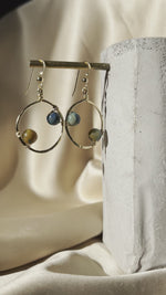 Load and play video in Gallery viewer, Planetary twins Hoop Earrings with 14k Gold Hand-Hammered Hoop
