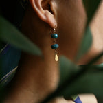 Load image into Gallery viewer, The Yoga Retreat in Bali Earrings is handcrafted from the 14K Gold-filled wire hook, natural peacock blue faceted Apatite bead with dazzling brass charms.
